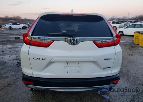 2019 Honda Cr-V Touring z USA, uszkodzony, nr VIN 5J6RW2H9XKL018991